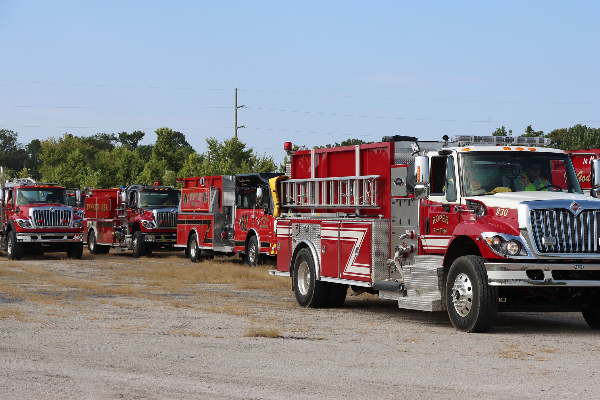 Several firetrucks forming a line
